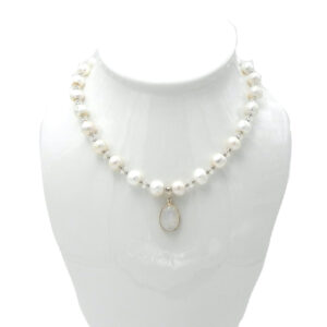 Dangling Baroque Pearl from Gold Tone Chain
