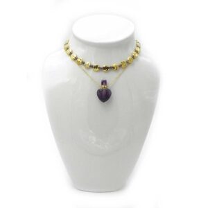 Mystery Potion Dangles from a Gold Tone Chain surrounded by Sparkling Metal Beads