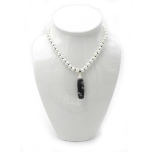 A Chain of Freshwater Pearls and an Etched Ceramic Pendant